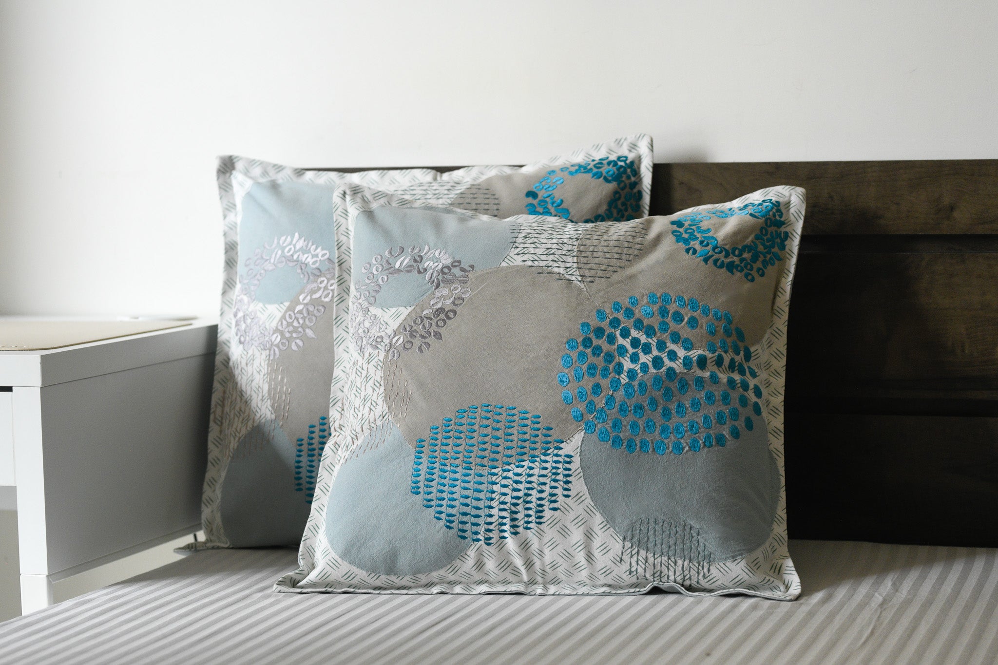 Whispered Petals – Abstract Floral Cushion in Cool Tones