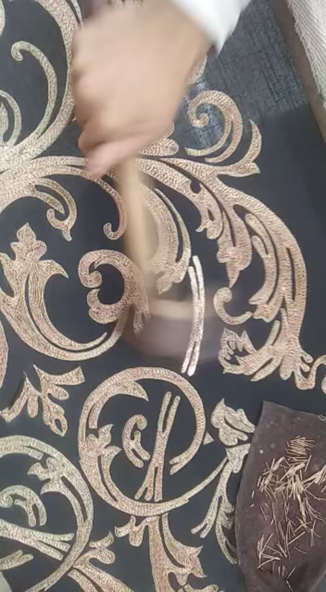 Exclusive black handwoven silk with pitta work in golden metal