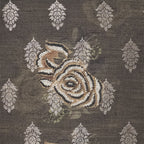 detail of a Beige, gold & white silk luxury cushion with beads in a white background