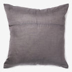 Grey and black silk and linen luxury cushion with a tassel