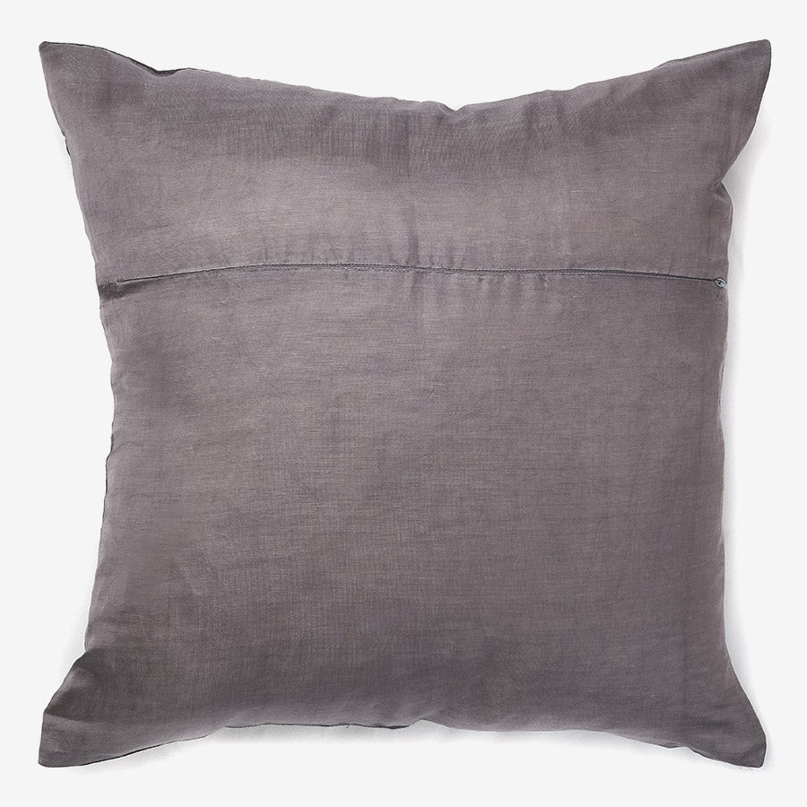 Grey and black silk and linen luxury cushion with a tassel
