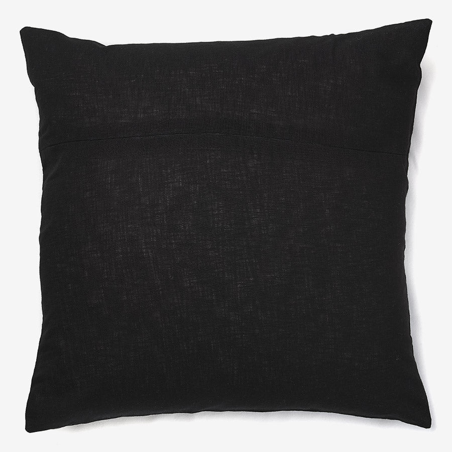 back of a Black linen luxury cushion with grey stones & gold orange tassels