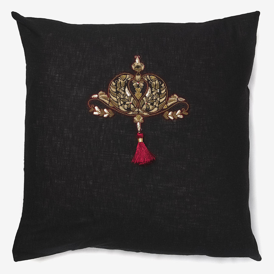 front of a Black linen luxury cushion with zardozi motifs, beads & tassel