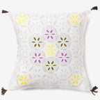 front of a white luxury cushion cover with multicolour leaves