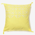 front of a yellow and white luxury cushion 